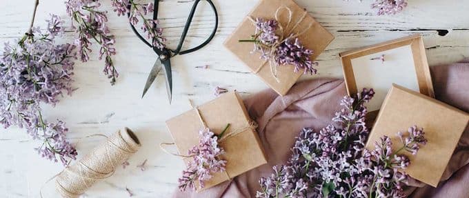 presents being wrapped with lilacs
