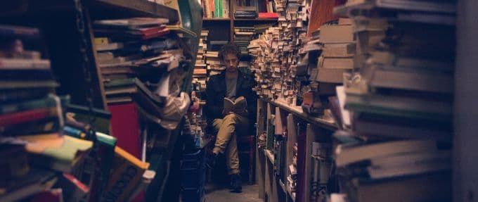 man reader in bookshop