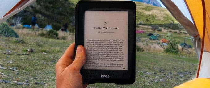 holding up ebook while camping