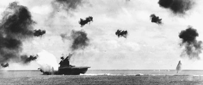 USS Yorktown is hit by a torpedo in the battle of midway, part of the pacific war in wwII