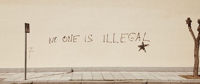 immigration graffiti no one is illegal