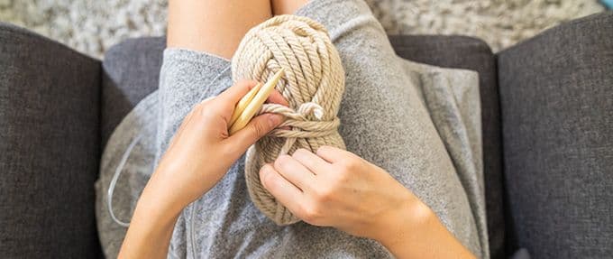 woman doing diy project - knitting