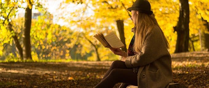 women reading biographical fiction novel