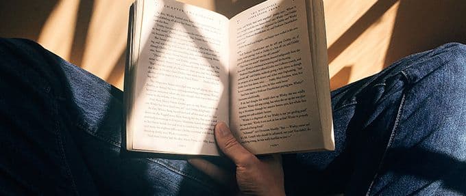 person reading in sunlight